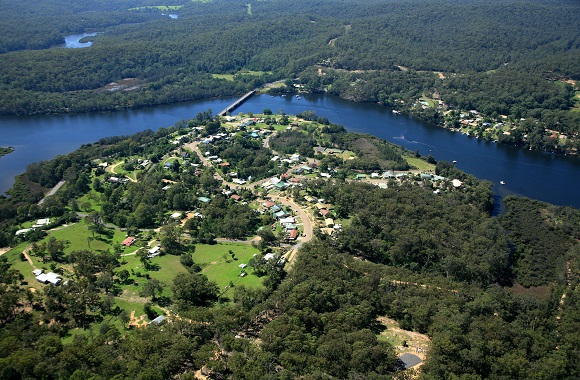 A river flows through the village of Nelligen