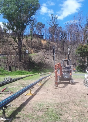 Long lengths of large poly pipe is laid out