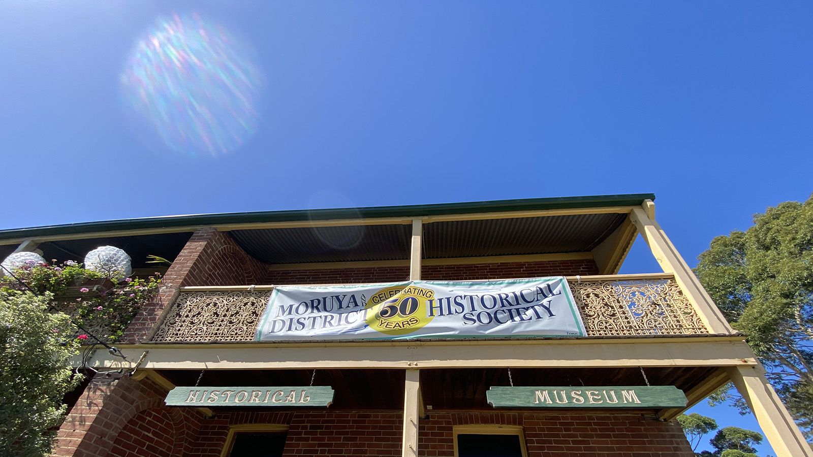 The external facade of the Moruya Museum with a banner titled Moruya Historical Society banner image