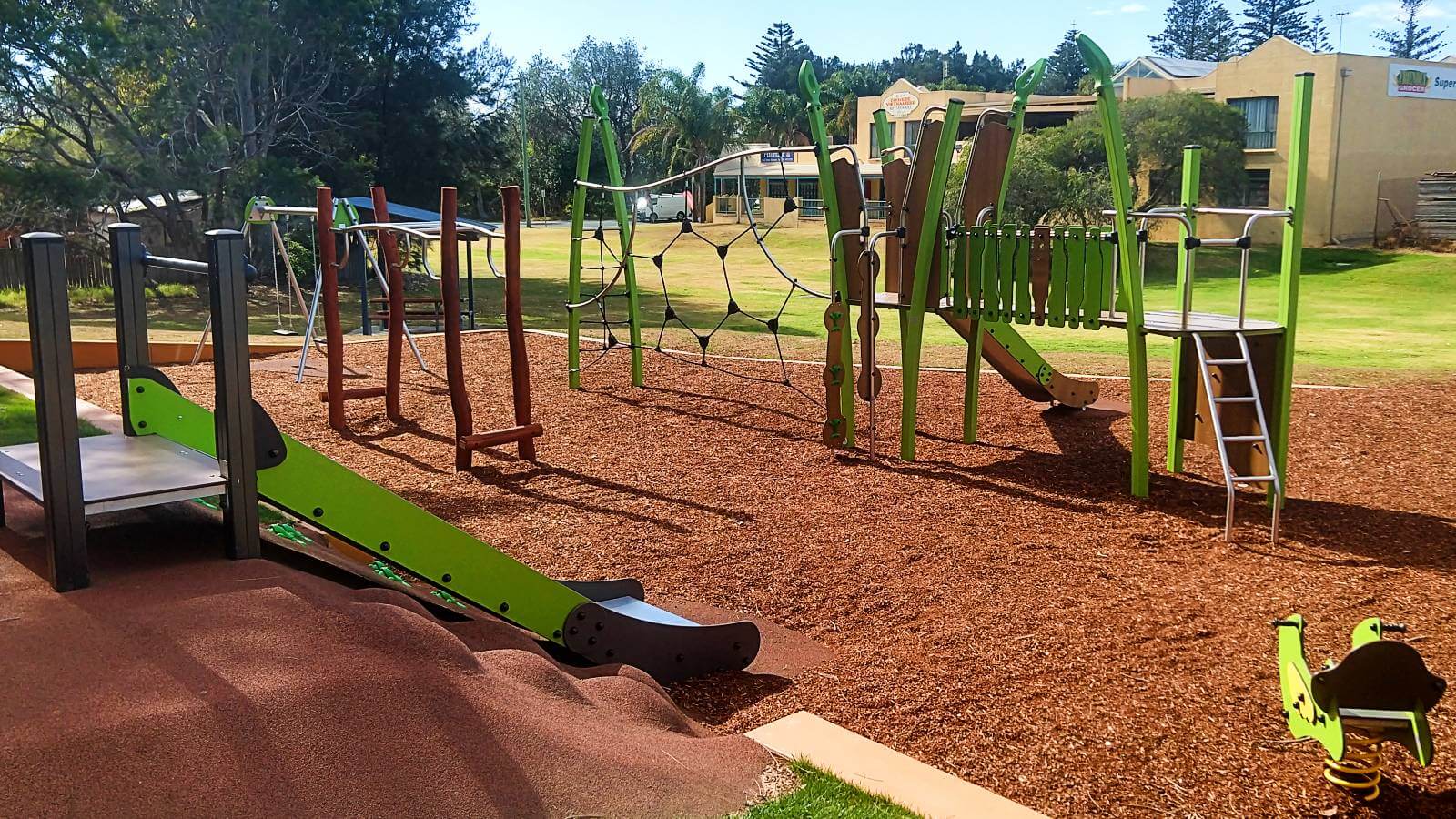 Image Evans Road playground at Tuross Head is set on a sloping treed reserve near the shopping centre. 