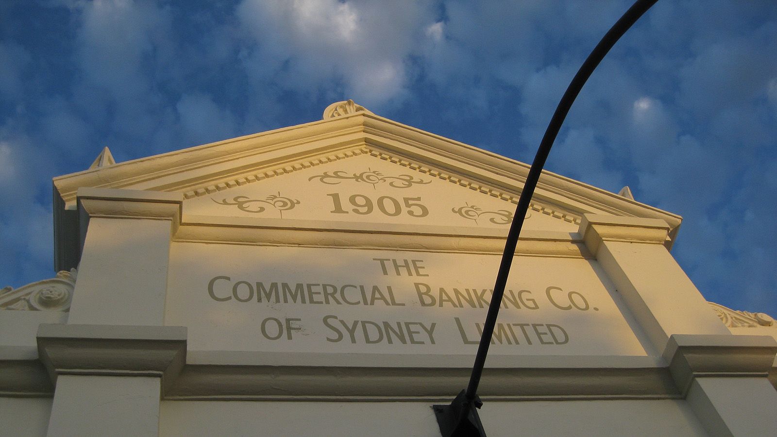 Cropped photograph of the facade of the Commercial Banking Co of Sydney Limited heritage building banner image