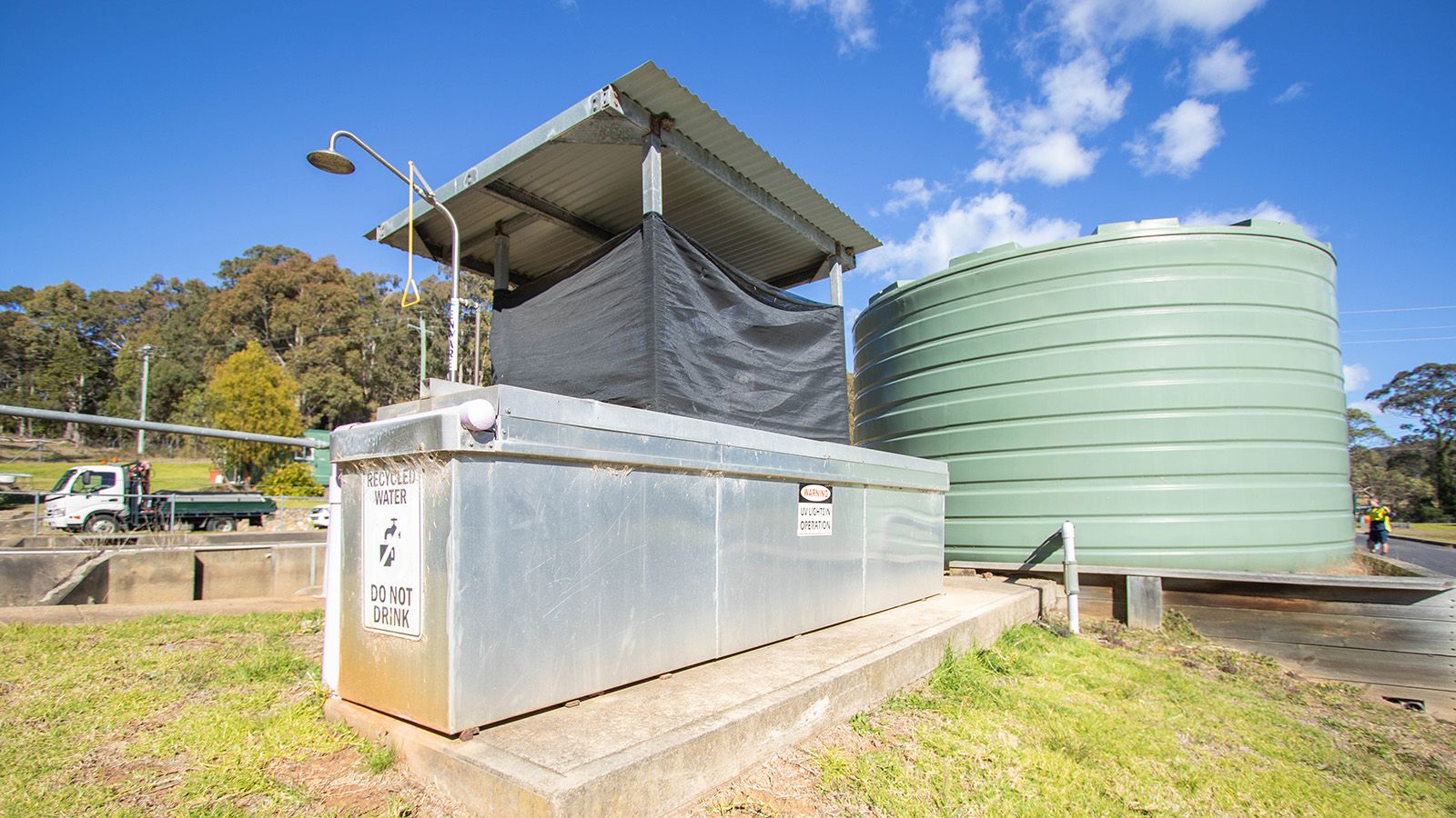 Recycled water container and large tank at a Eurobodalla Council sewer treatment facility banner image