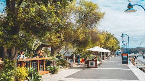 a path along water with shops