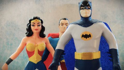 Three hero action figures