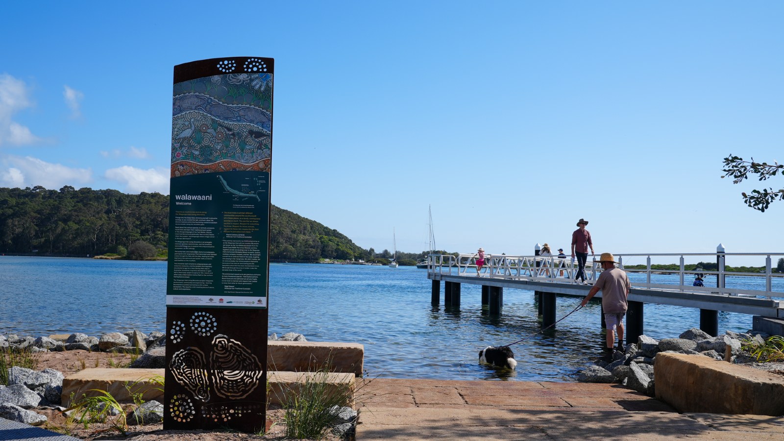 Image View of Wagonga Inlet Living Shoreline signage in front of water