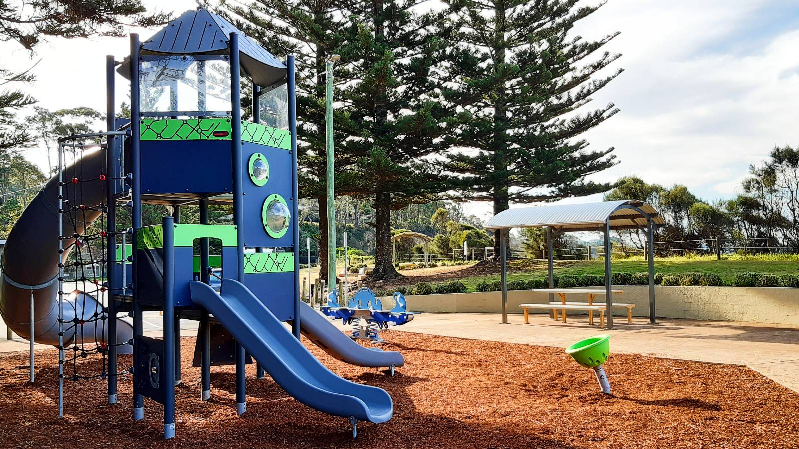 Image Blue and green nautical themed tower and slide playground at Surf Beach off Beach Road.