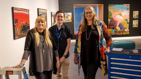 Gallery staff members in the Basil Sellers Exhibition Center.