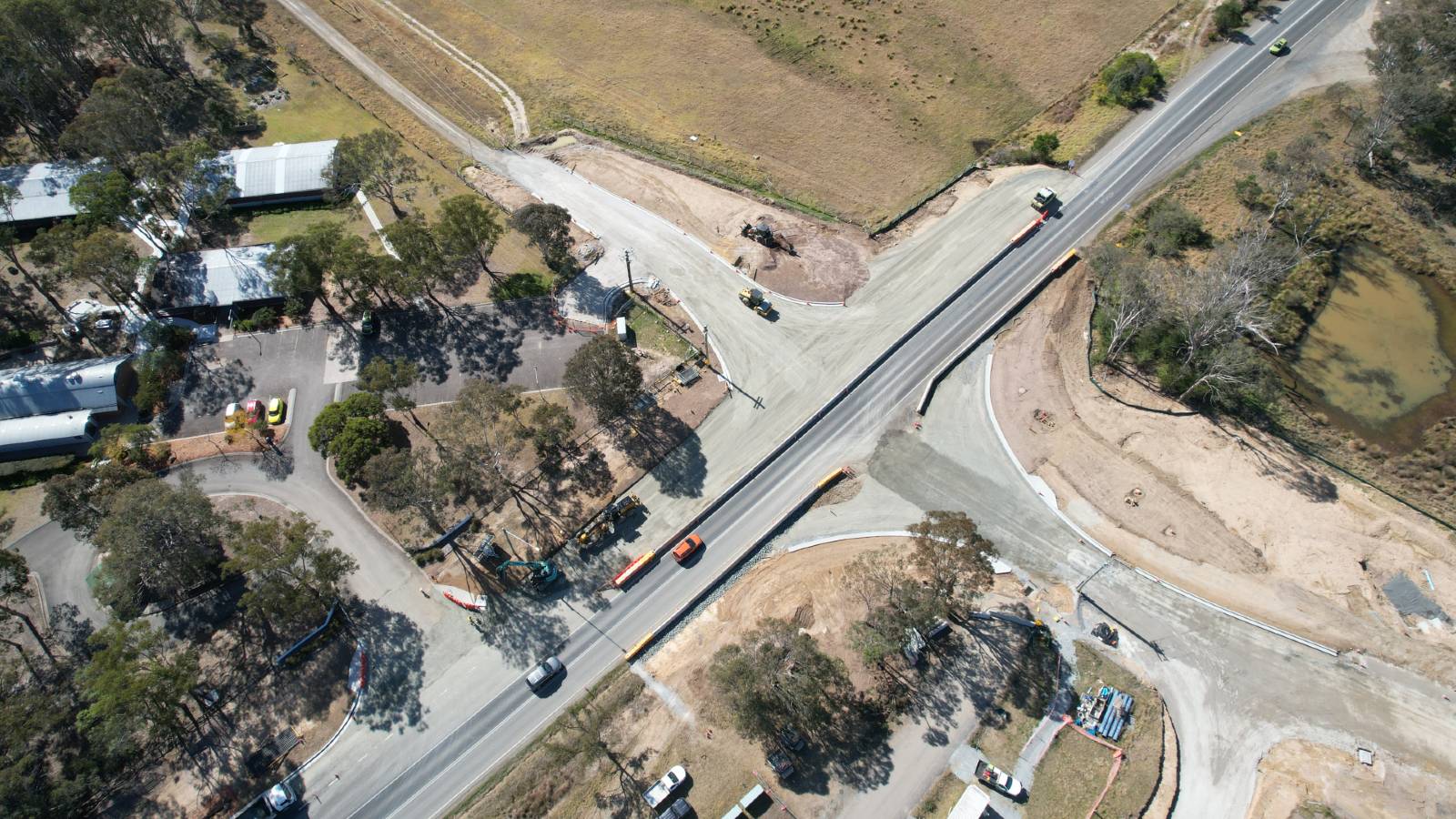 Image A drone image shows road building construction acivity on either side of a road