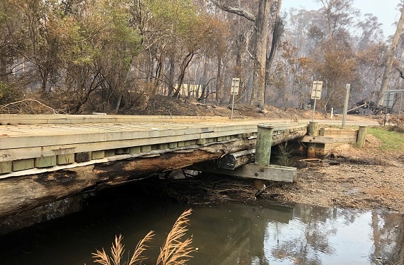 The timber bridge bearer is burnt