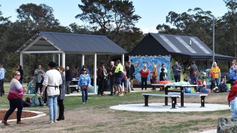 Crowd enjoying playground and facilities at Mogo Recreation Park