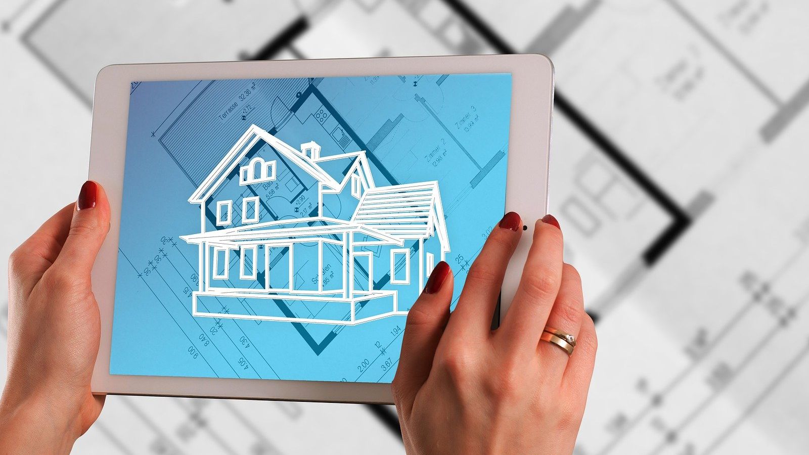 A tablet device displaying a digital drawing of a house. banner image