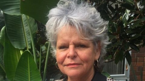 A close-up photo of a woman's face.