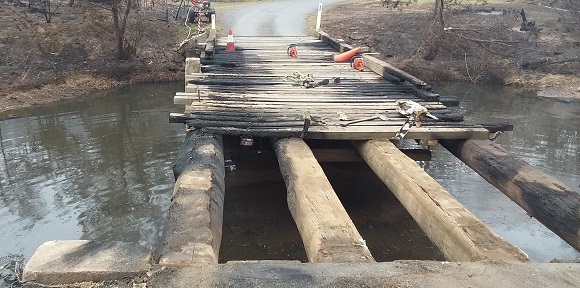 Image The burnt deck timbers are being removed