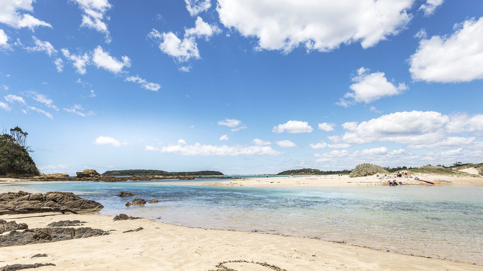 The inlet at Candlagan Creek near Broulee on a sunny day banner image