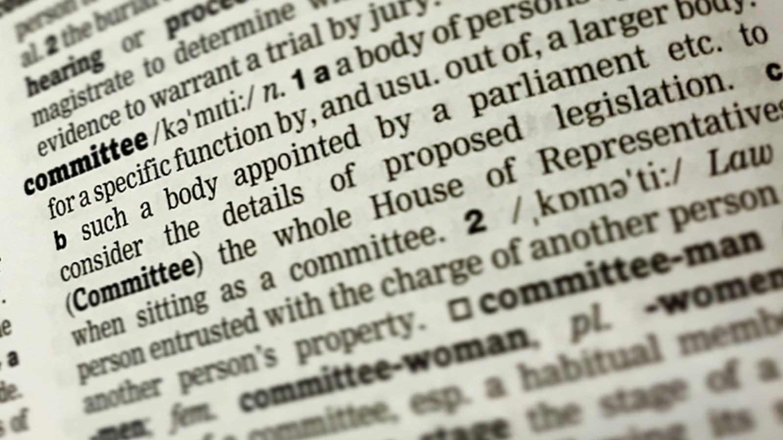 A dictionary page showing the word Committee and its definition banner image