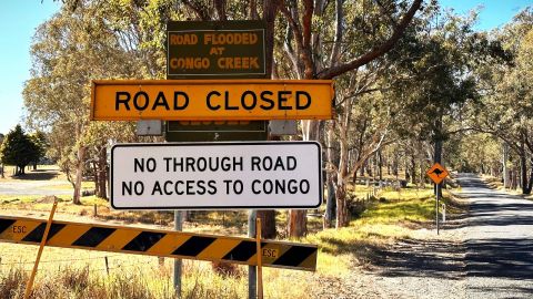 Small country road with road closed signs