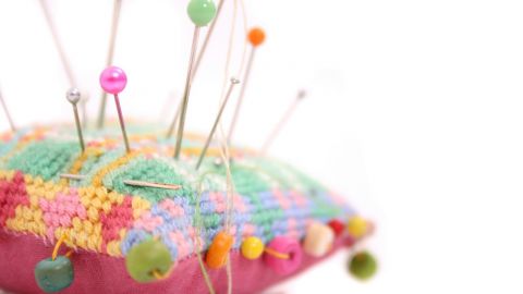Library - colourful pin cushion with pins