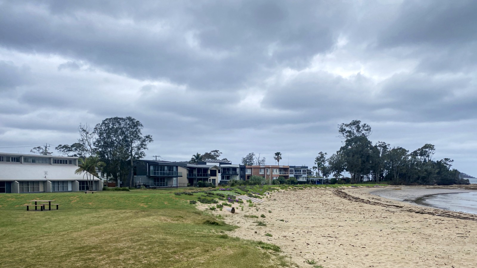 A raised grass embankment has been photoshopped into an image of the coastline