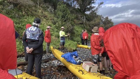 Council's invasive species officer Paul Martin speaking to volunteers at Snapper Island.