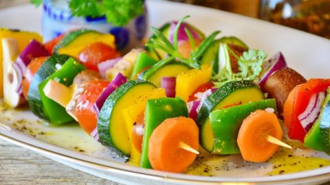 Vegetable skewers on a plate