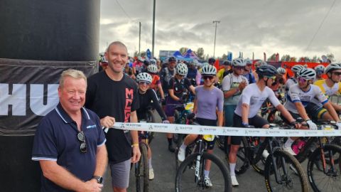 Two men standing at the start of a mountain bike race at Sea Otter Australia event