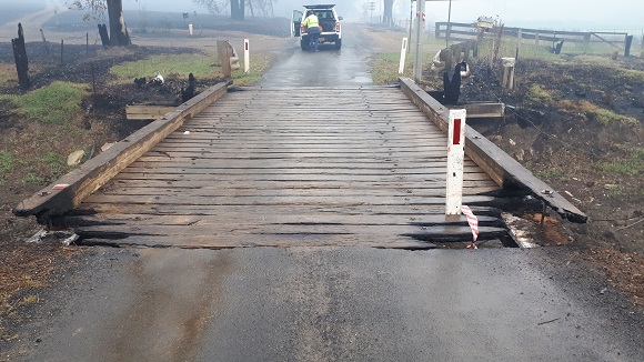 Image The bridge deck timbers are burnt