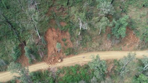 Aerial view of rubble on a cracked road