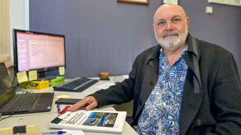 Man sitting at a desk