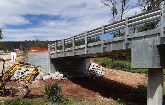 Image A concrete bridge is under cosntruction.